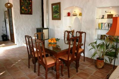 Dining room with original feature alcove in the background.